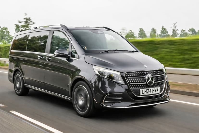 Black Mercedes V-Class people carrier in motion